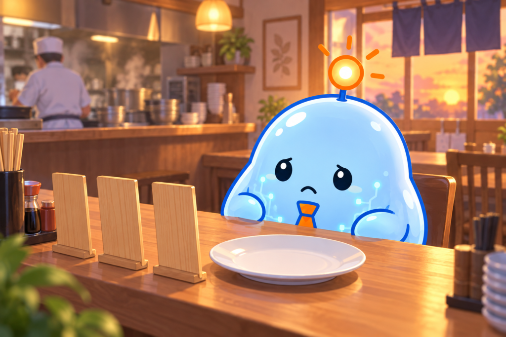 定食屋のカウンターで、マスコットが机の上に3枚の無地のメニュー札を並べて両手をおなかの前で組み、向かいの空いた皿を見つめているシーン